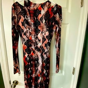 Snake skin print, sneak peak shoulder, long sleeve